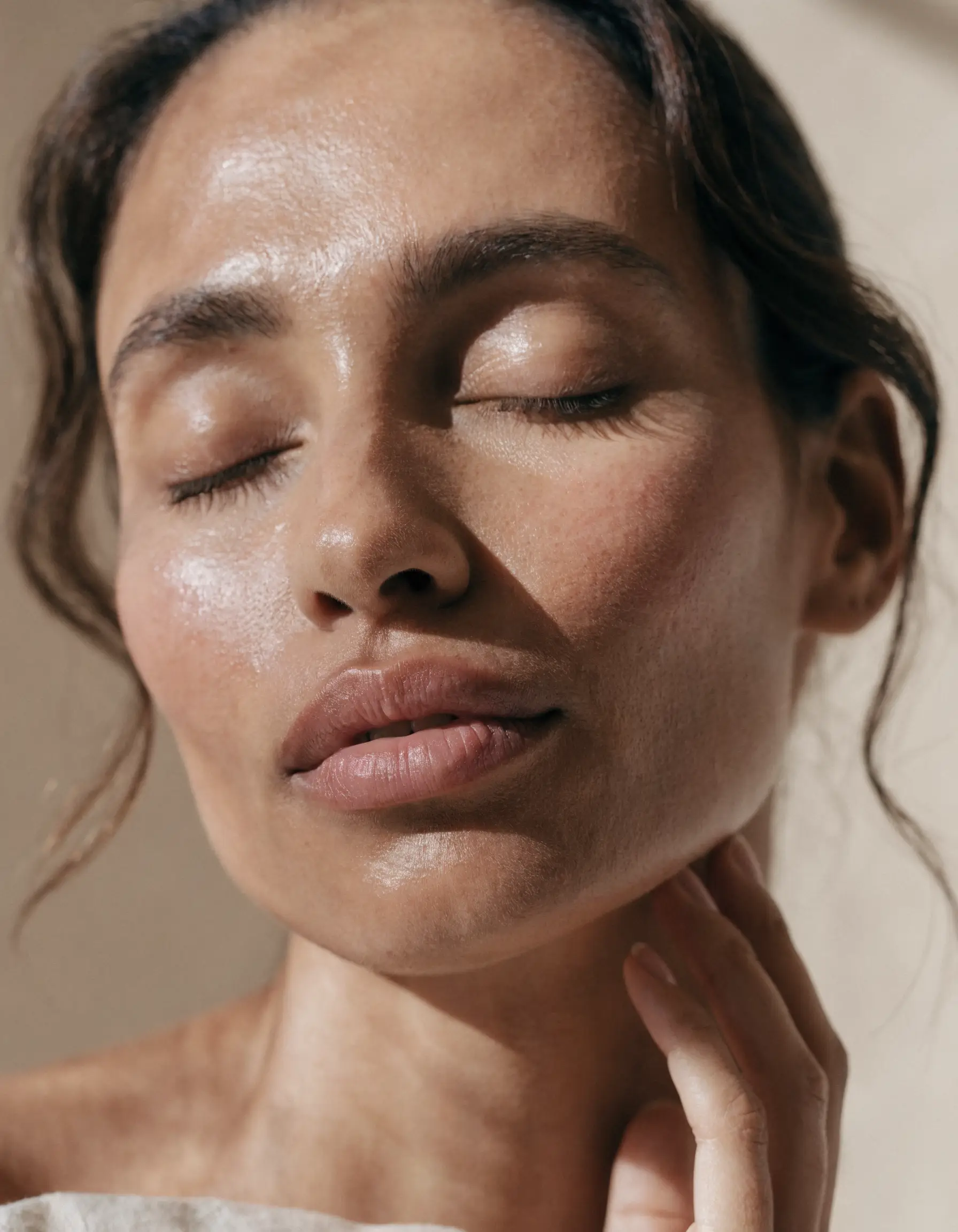 Woman with naturally glowing skin after treatment at Good Skin Days